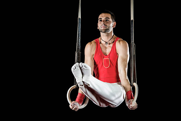 istock Sportsman on gymnastics rings. 465484211