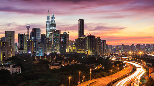 istock City skyline - Kuala Lumpur at dusk 465484931