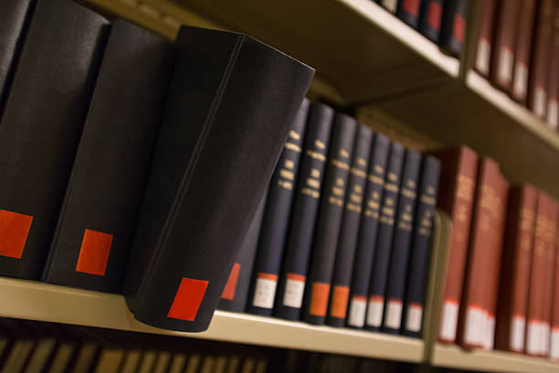 istock book popping out of a bookshelf 465484978