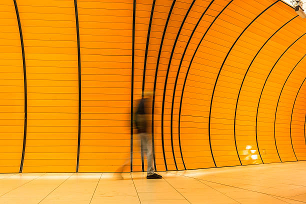 istock Commuter in orange tunnel 465484983