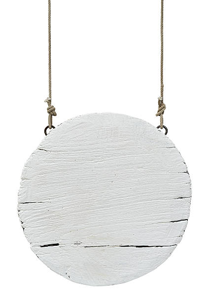 Old weathered white wood signboard. Old weathered round white wood signboard, hanging by old rope, isolated on white, clipping path included. hanging signboard stock pictures, royalty-free photos & images