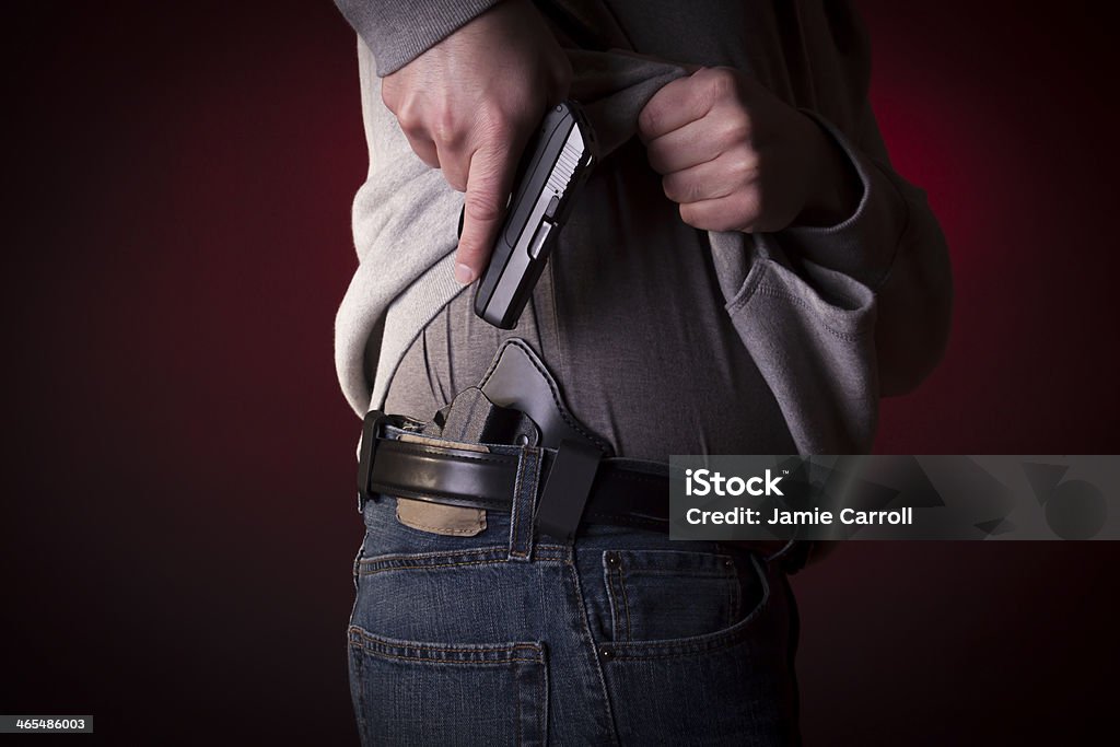 Verdeckte Handgepäck pistol - Lizenzfrei Schusswaffe Stock-Foto