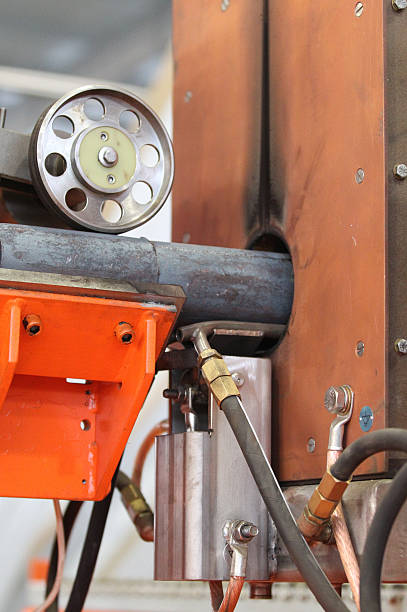 istock moving stream of metal workpieces 465486248