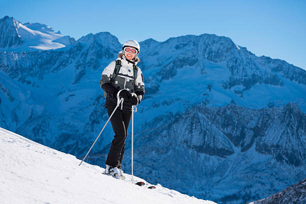istock Woman snow skier on ski vacation 465486783