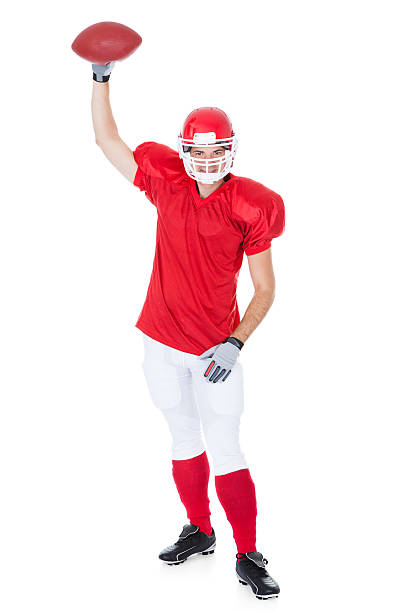 istock American Football Player Holding Ball 465487191