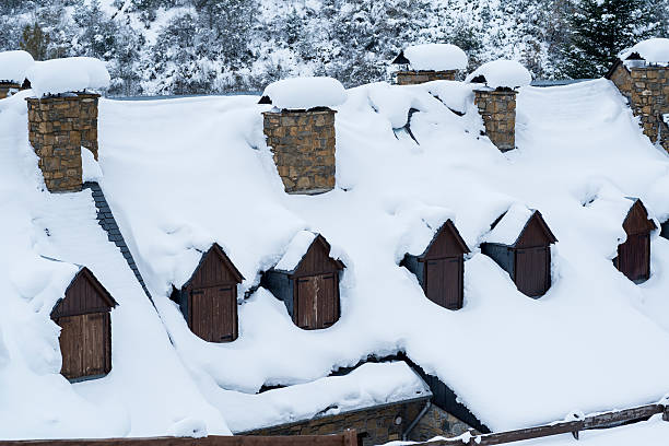 istock Mountain houses covered on Snow 465488863