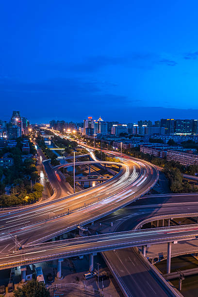 istock Urban highway traffic at night 465489780