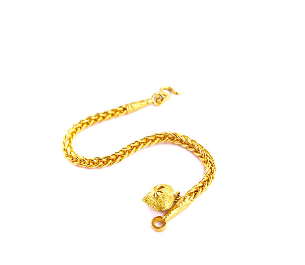istock golden necklace isolated on white background 465490233