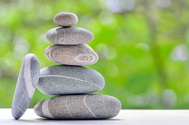 istock Pyramid of stone, river stones arranged 465490943