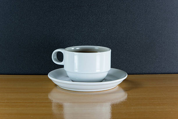 istock Still life white cup of coffee on wooden table 465491974