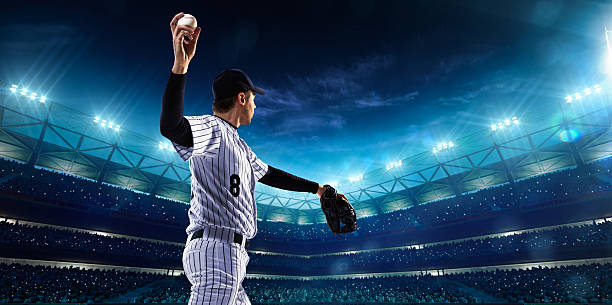 istock Professional baseball players on night grand arena 465493728