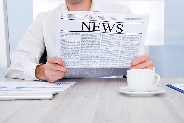 istock Businessman Reading Newspaper 465495951