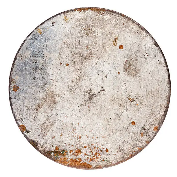 Photo of Rusty round metal plate