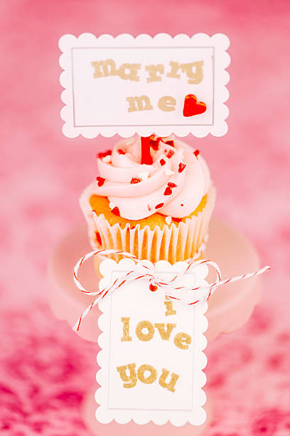 istock Wedding Cupcake with Marry Me Sign 465497393