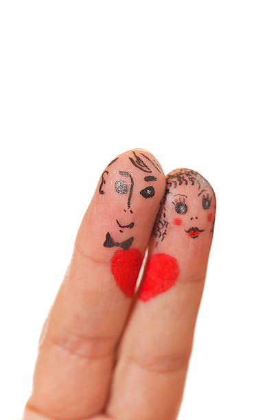 istock Painted finger couple smiley isolated on white 465497835