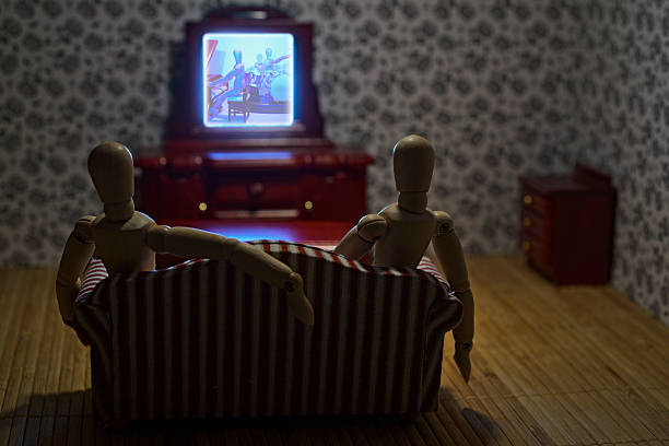 istock Family watching television 465497877