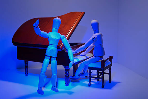 istock Pianist and singer in the blue stage light 465497977