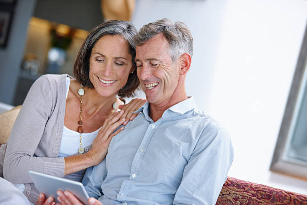 istock Relaxing on the couch with some online entertainment 465498190