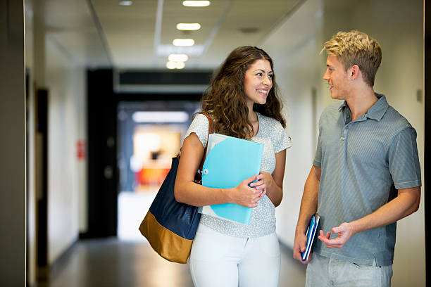 Teenage couple in school