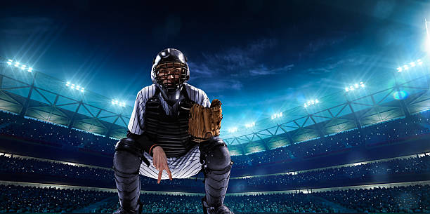 istock Professional baseball players on night grand arena 465498504
