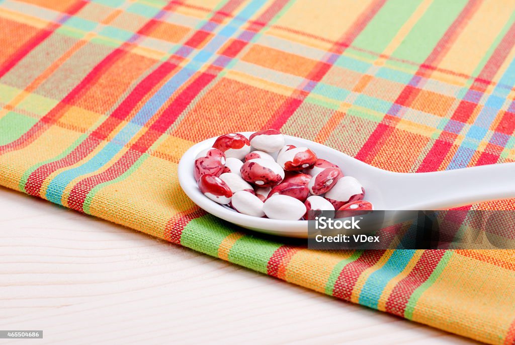 raw speckled beans on board diet food raw speckled beans  board diet food 2015 Stock Photo