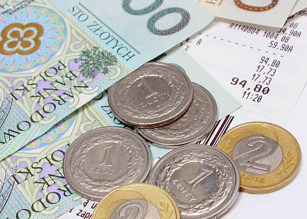 istock Money and coins with receipt on white background 465505816