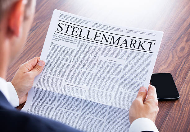 istock Businessman Reading Newspaper 465505915