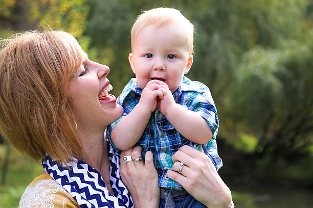 istock Adorable Baby With His Beautiful Mother 465506557