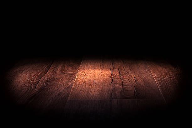 istock Light on wooden floor in empty room 465507940
