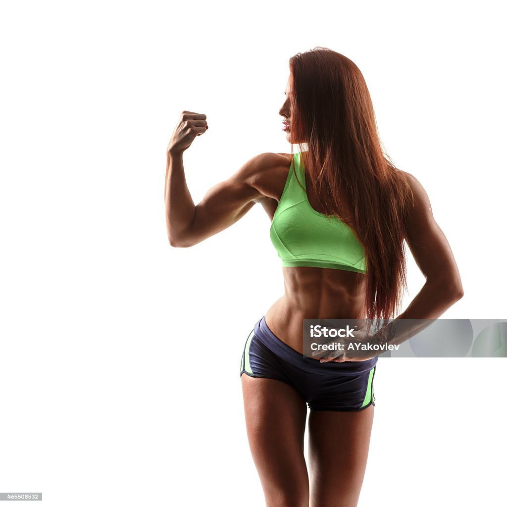 fitness woman beautiful fitness female posing on studio background 2015 Stock Photo