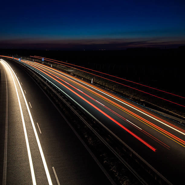 istock Cars moving fast on a highway 465509240