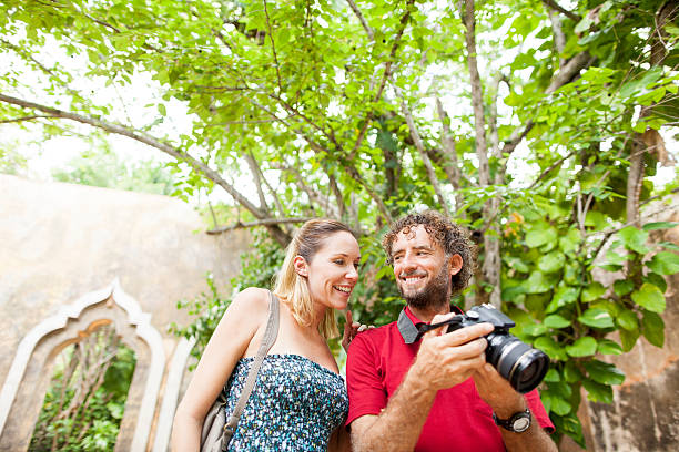 istock Tourist couple taking pictures 465509353