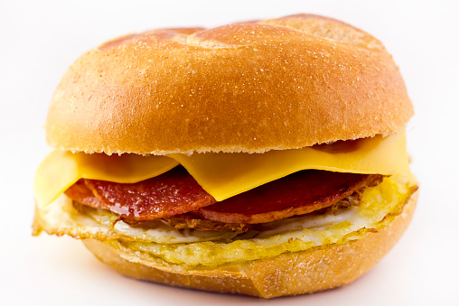 Taylor ham, pork roll, egg and cheese breakfast sandwich on a kaiser roll from New Jersey