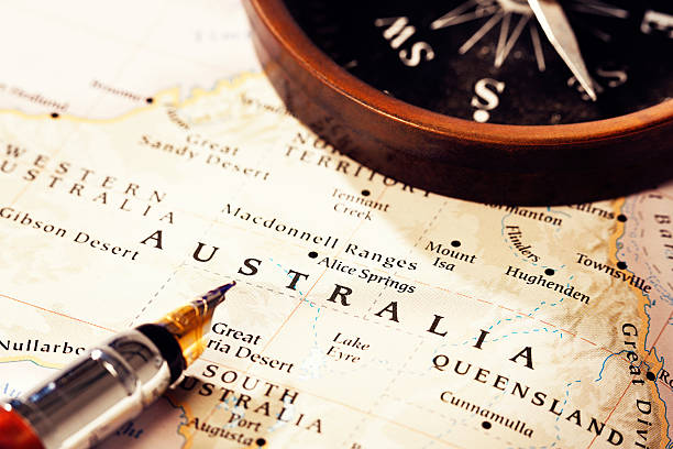 istock Off to the outback! Compass and pen on Australian map 465510045