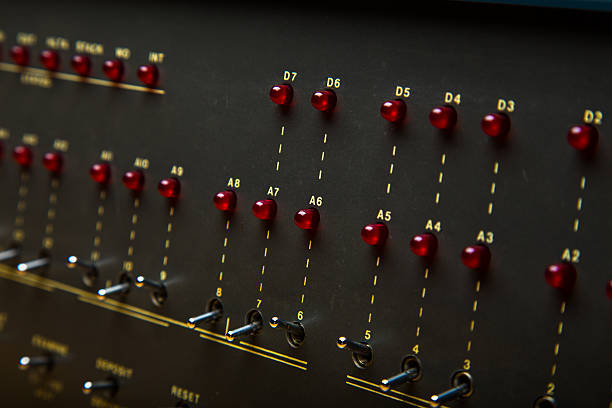 Vintage Altair 8800 Computer Detail of the switches and lights on the front of a historic Altair 8800 computer from the 1970's. computer mainframe old retro revival stock pictures, royalty-free photos & images