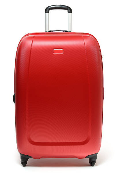 valigia rossa - valigia a rotelle foto e immagini stock