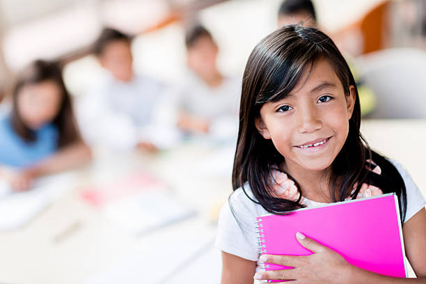 istock Little girl at school 465511673