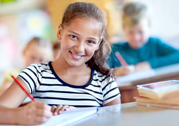 I love this subject! Portrait of a young female student studying in class 12 13 years pre adolescent child female blond hair stock pictures, royalty-free photos & images