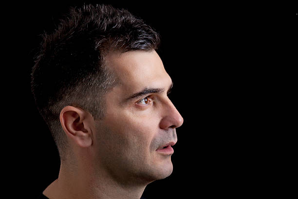 istock Profile of a man on black background 465511941