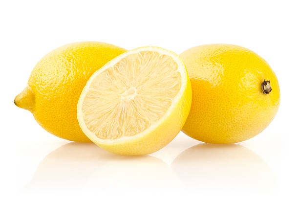 레몬, 하프 흰색 배경의 - lemon textured peel portion 뉴스 사진 이미지