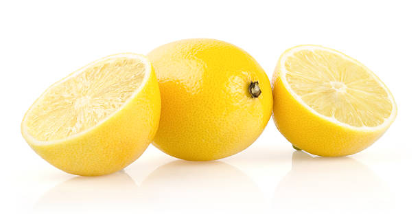 レモン半で、白背景 - lemon textured peel portion ストックフォトと画像