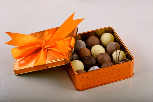 Finest filled Swiss Chocolates in a orange box with a bow