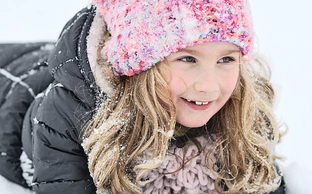 istock Young girl in a winter scene. 465515791