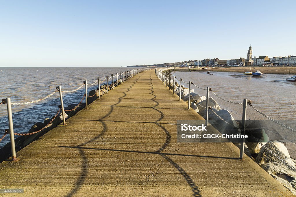 Herne Bay, Kent, UK Herne Bay harbour wall rock water break. Herne Bay Stock Photo