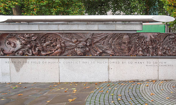 London, UK - October 23, 2013: War memorial for the Battle of Britain with a famous line by Sir Winston Churchill saying Never in the field of human conflict was so much owed by so many to so few