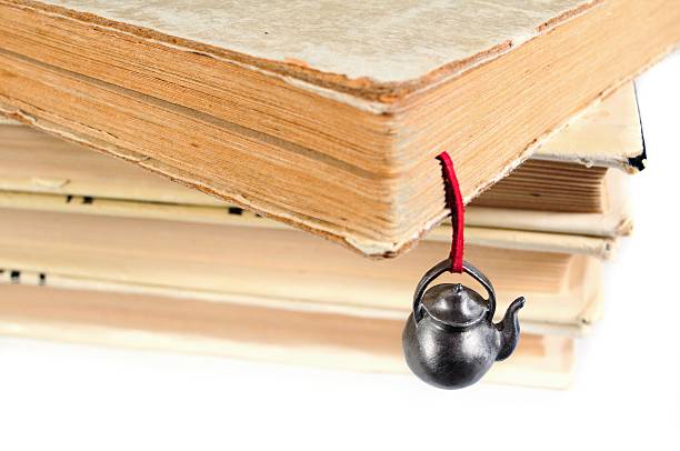 istock Stack of used books with a hand-made bookmark 465516970