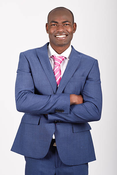 istock Black businessman wearing suit and tie smiling 465517172