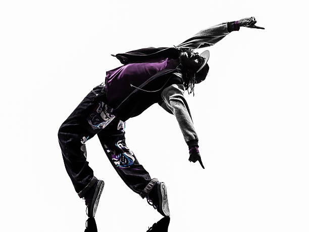 istock hip hop acrobatic break dancer breakdancing young man silhouette 465521035