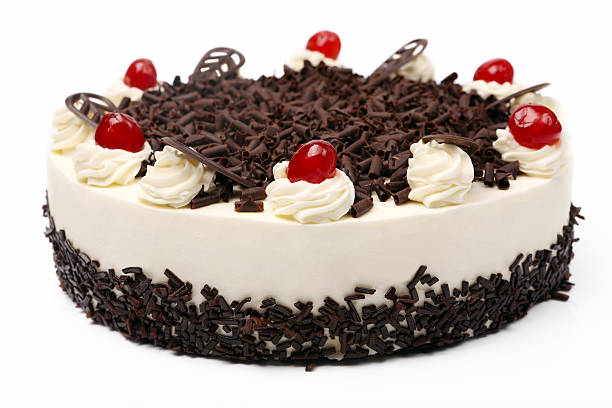 istock Cream vanilla cake with chocolate and cherries on white backgrou 465521134