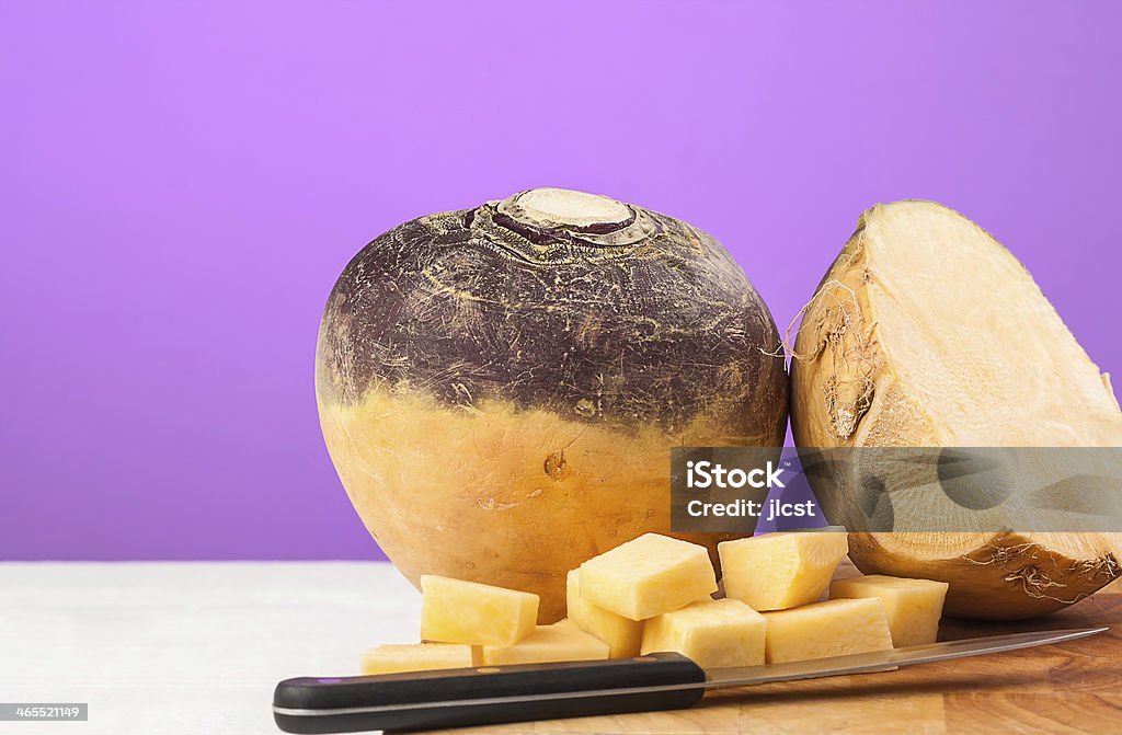 Swede Swede on choping board with copy space Brassica Stock Photo